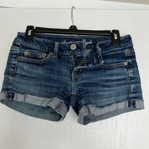 American eagle jean shorts, size 0, stretch, folded ends with slight fray.